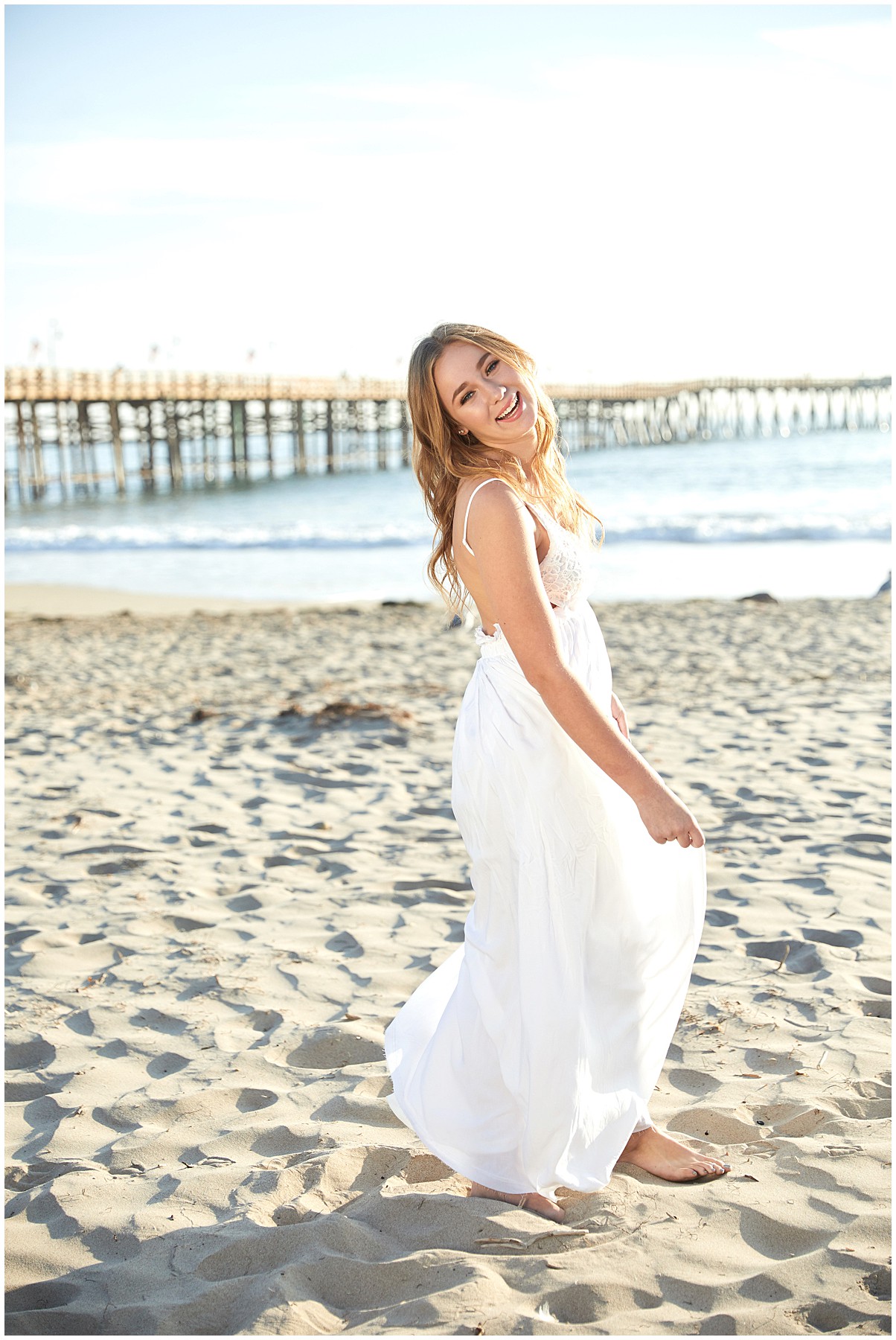 candid beach picture in southern california by tara rochelle senior portraits