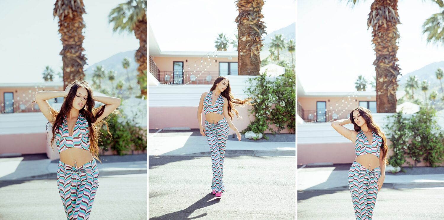 Editorial senior portrait session in Palm Springs featuring a model in colorful retro two-piece outfit posing beside a vintage Mercedes in the California desert