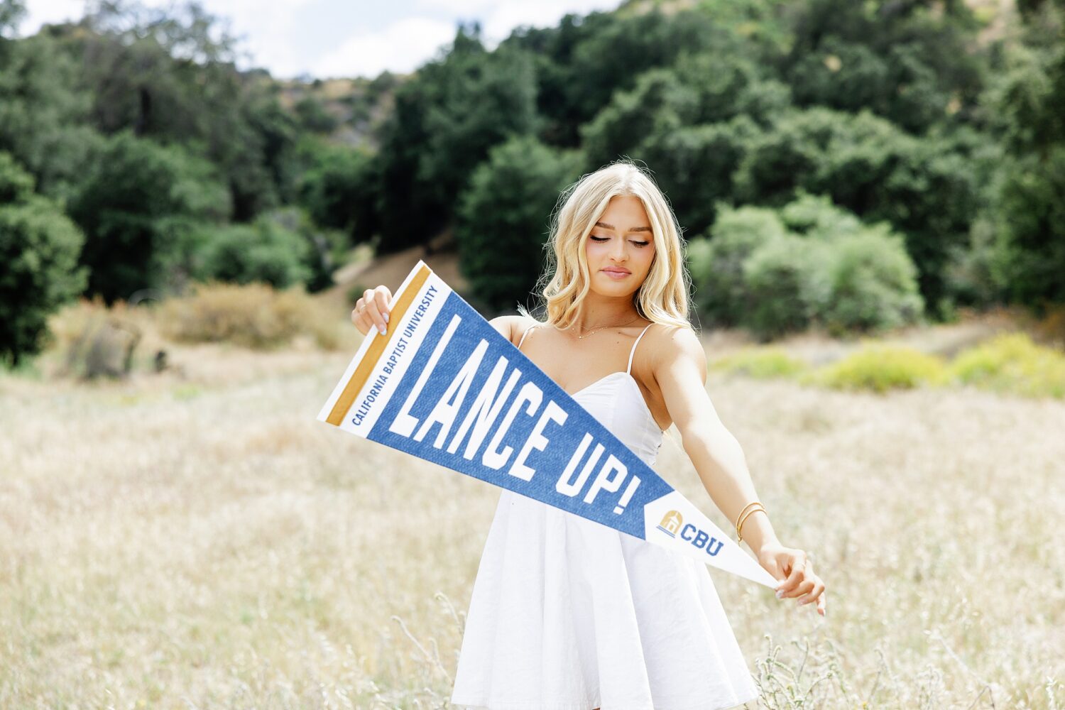 CBU Lance Up pennant senior girl golden field Agoura Hills California