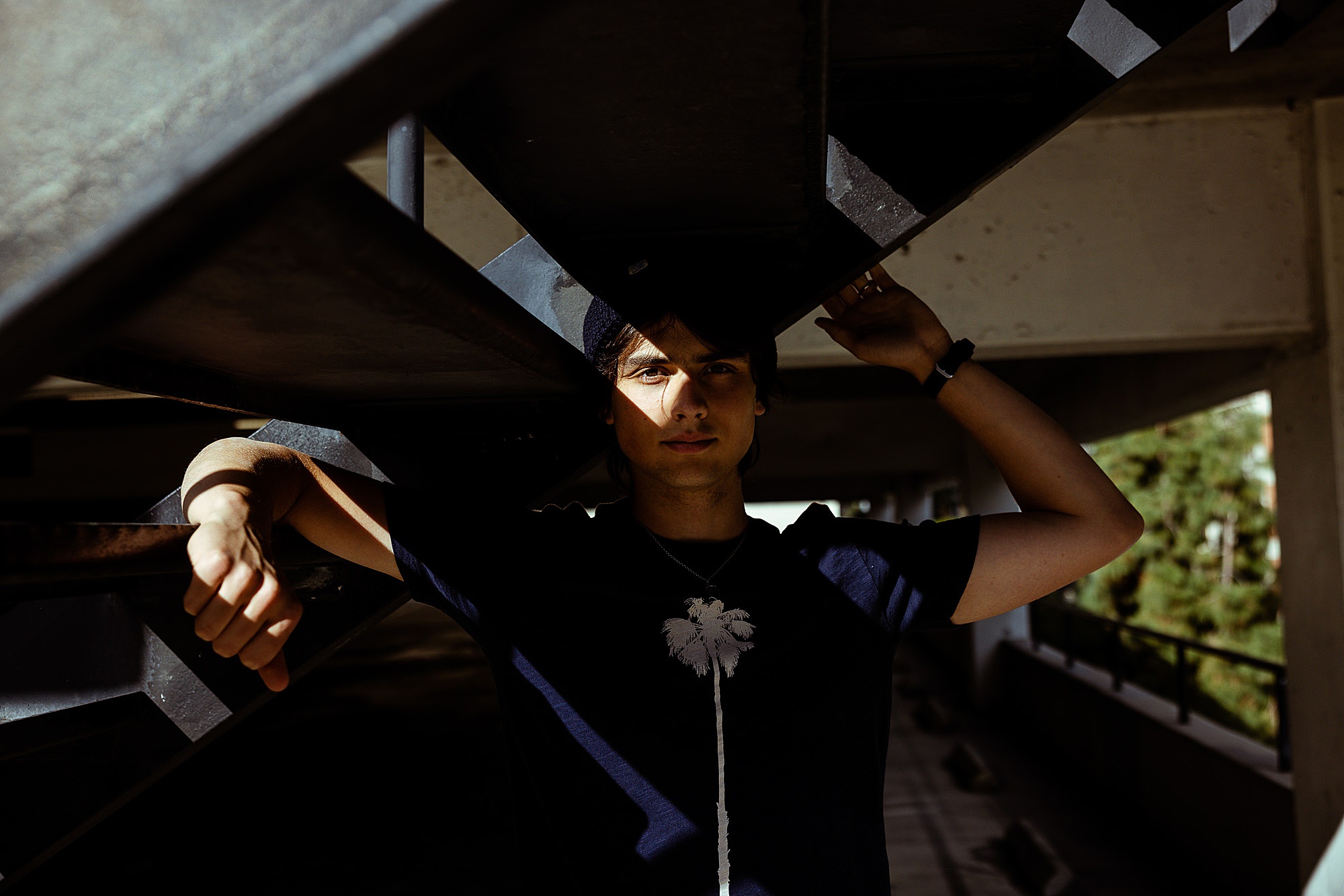 moody lighting for a guys senior pictures in Los Angeles